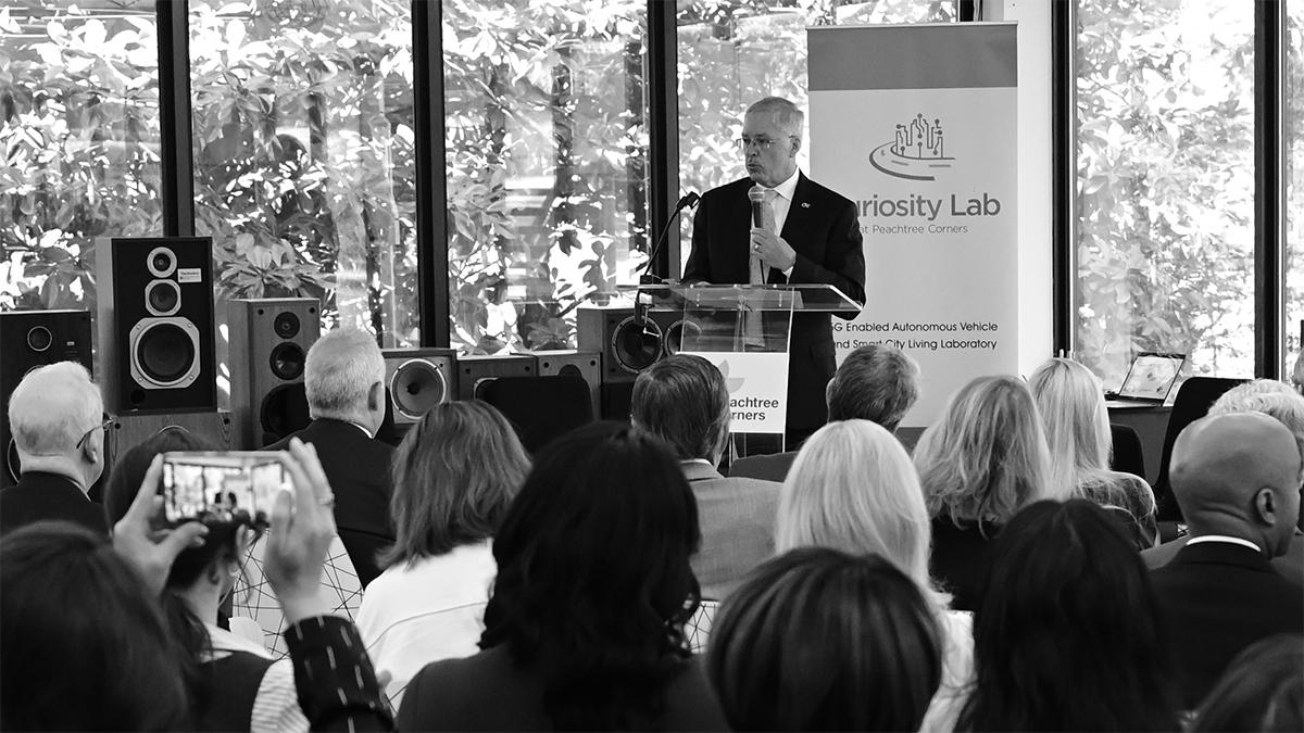 Nelson Baker speaks during the ribbon-cutting ceremony.