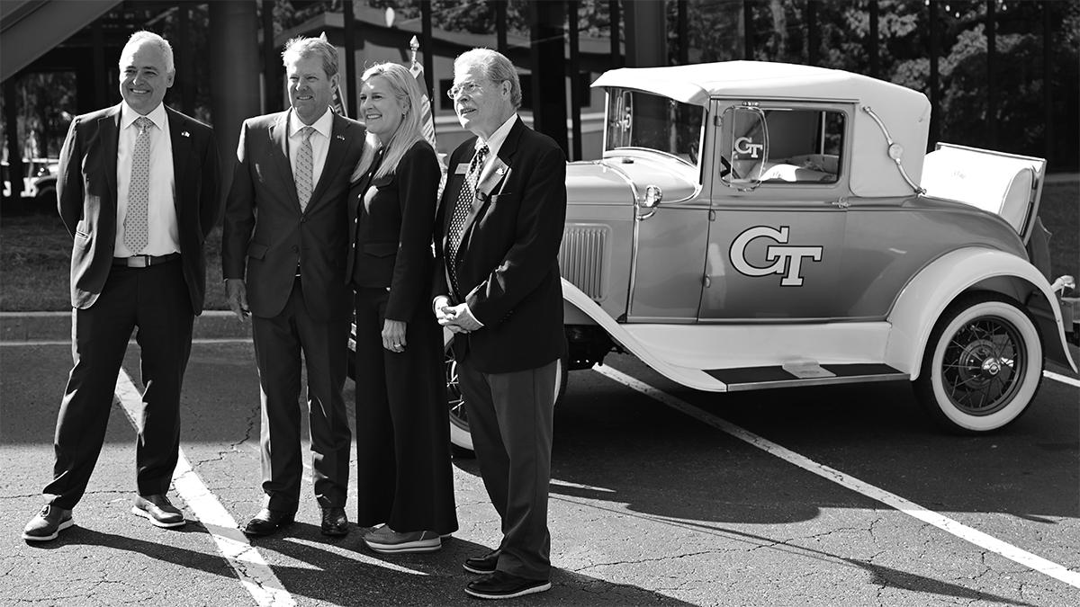 President Cabrera, Governor and First Lady Kemp, Mayor Mason in front of the Ramblin' Reck